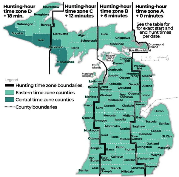 Map of Michigan showing four hunting-hour time zones (A, B, C, D) with varying time adjustments (0, 6, 12, 18 minutes) from east to west, delineating Eastern and Central time zone counties and hunting time zone boundaries.
