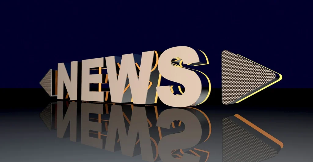 A 3D rendered graphic of the word "NEWS" in bold, metallic block letters sitting on a reflective dark surface. The text is flanked by two stylized arrows pointing outward, set against a deep blue background, symbolizing the directional flow of digital information.